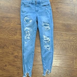 american eagle light blue ripped skinny jeans
